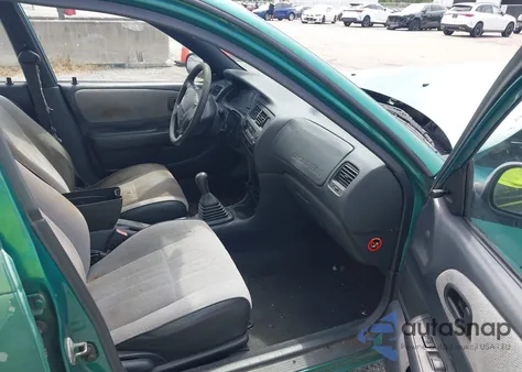 1997 Toyota Corolla Ce z USA, uszkodzony, nr VIN 1NXBA02E6VZ578131